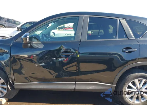 2014 Mazda Cx-5 Touring z USA, uszkodzony, nr VIN JM3KE4CY6E0406740